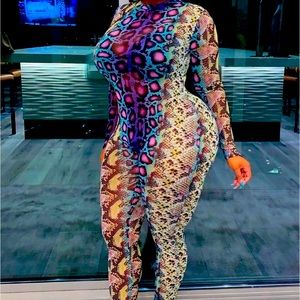 Snake skin Fashion nova jumpsuit Brand New! Size is 2x. Very stretchy!